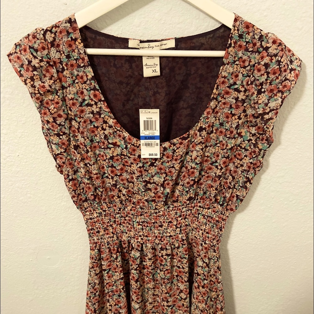 Autumn floral American Rag Junior size dress.Lined,capped sleeves,elastic waist